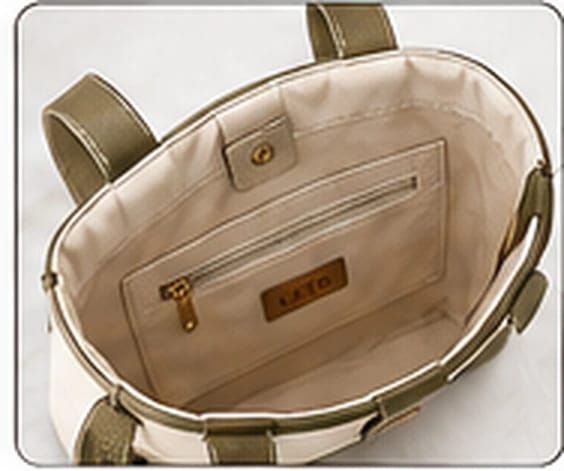 Inside the Design 2 canvas tote, showing the lining and inside zip pocket
